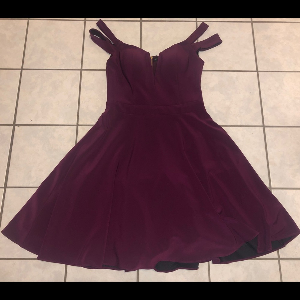XScape Dress. Dark maroon/purple tint.